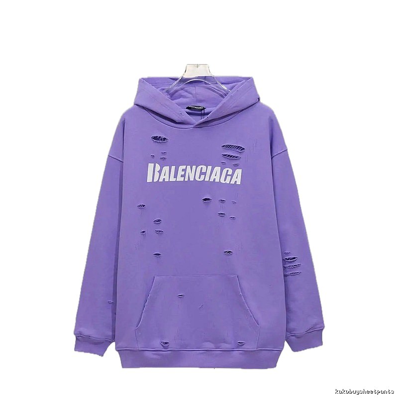 Balenciaga's ripped purple sweatshirt
