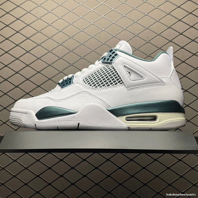 Jordan White and Green Basketball High-Tops Defined by Sculpted Heel