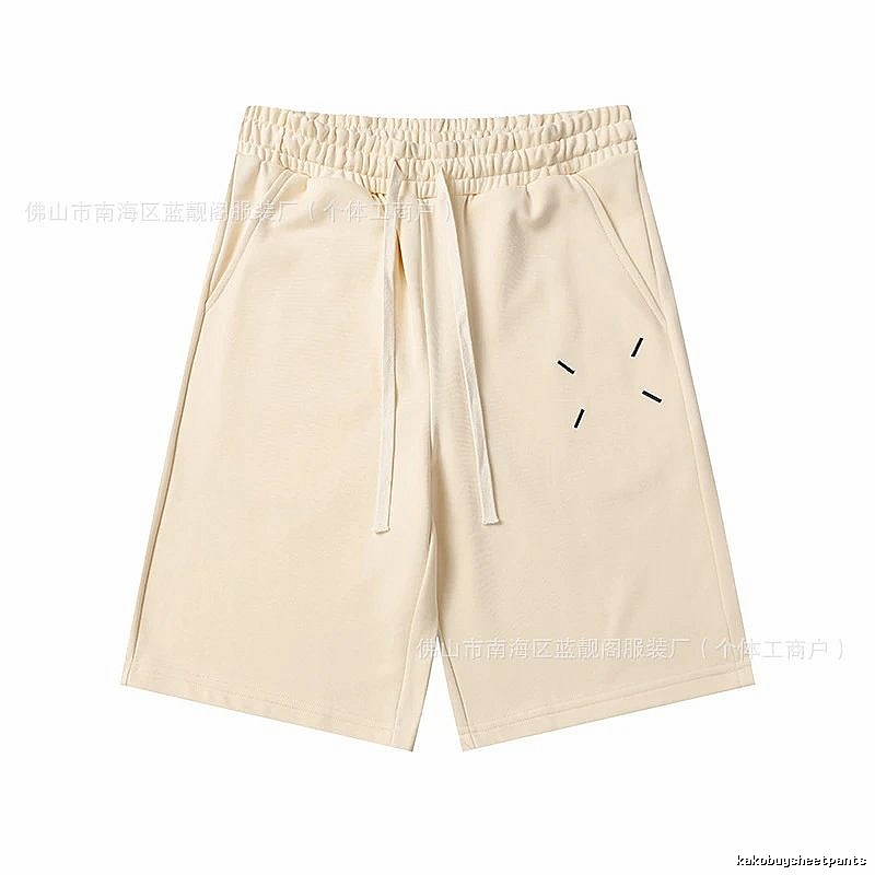 Maison Margiela minimalist style beige shorts