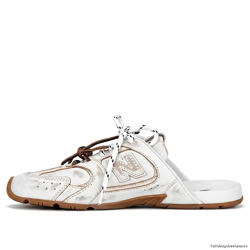 Miu Miu retro-style white slippers